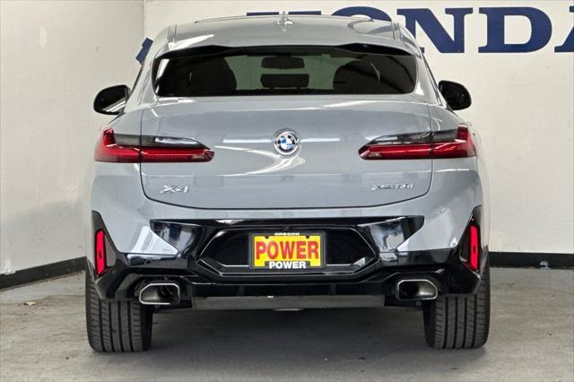 used 2022 BMW X4 car, priced at $37,995