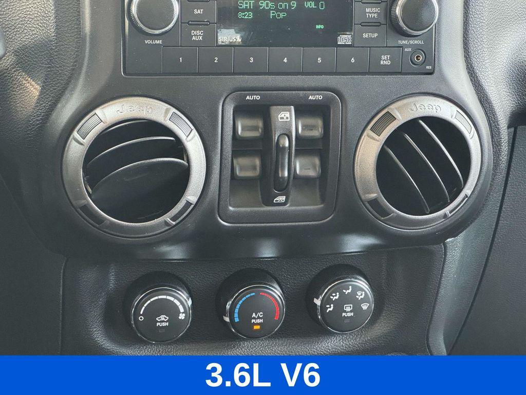 used 2014 Jeep Wrangler Unlimited car, priced at $17,598