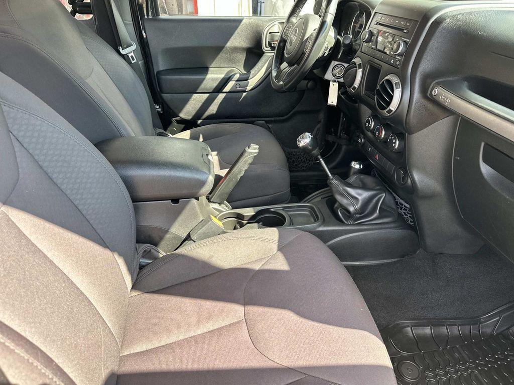 used 2015 Jeep Wrangler car, priced at $16,495