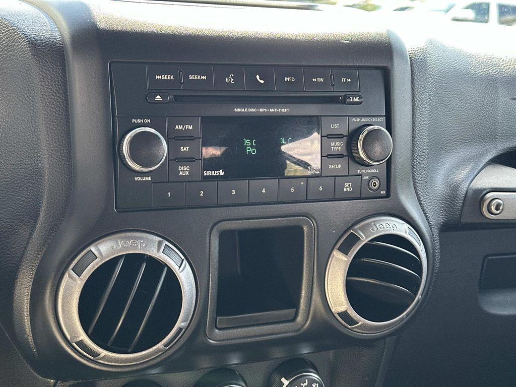 used 2015 Jeep Wrangler car, priced at $16,495
