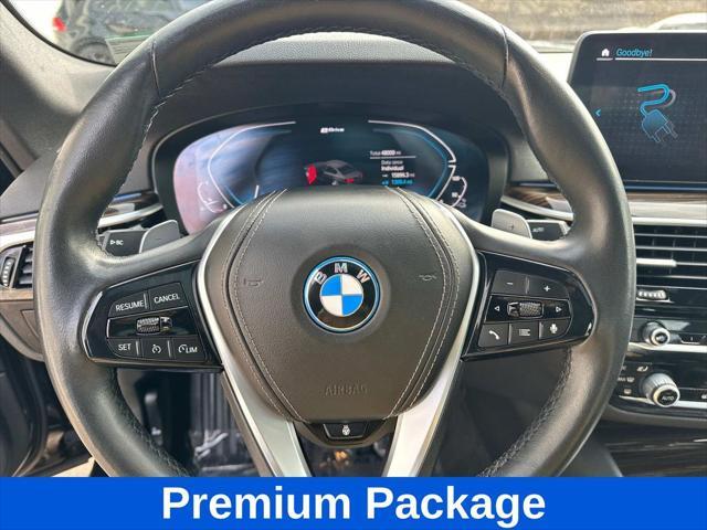 used 2023 BMW 530e car, priced at $33,000