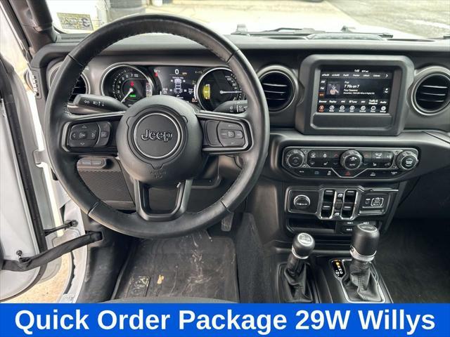 used 2023 Jeep Wrangler 4xe car, priced at $34,211