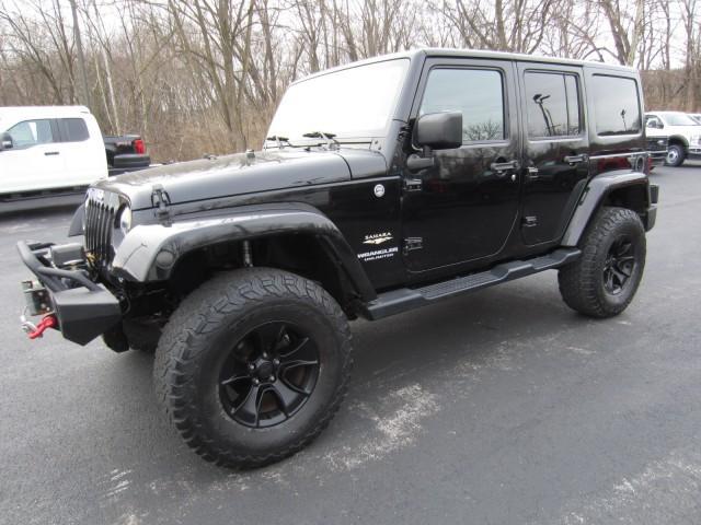 used 2015 Jeep Wrangler Unlimited car, priced at $23,996