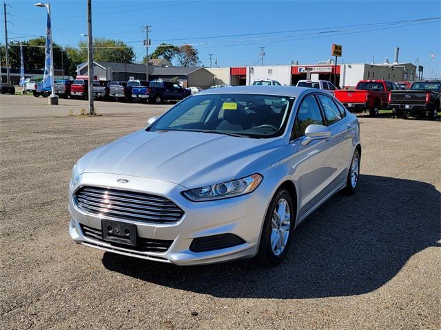 used 2014 Ford Fusion car, priced at $7,489