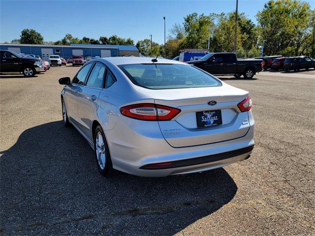 used 2014 Ford Fusion car, priced at $7,489