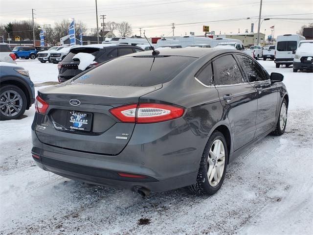 used 2015 Ford Fusion car, priced at $7,990