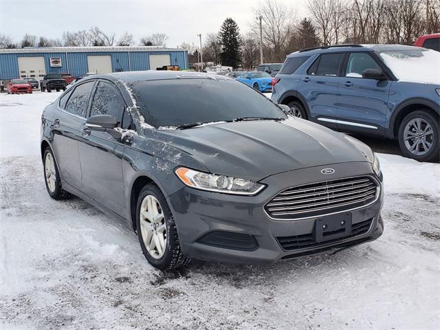 used 2015 Ford Fusion car, priced at $7,990