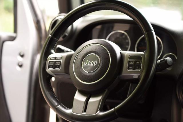 used 2016 Jeep Wrangler Unlimited car, priced at $17,999