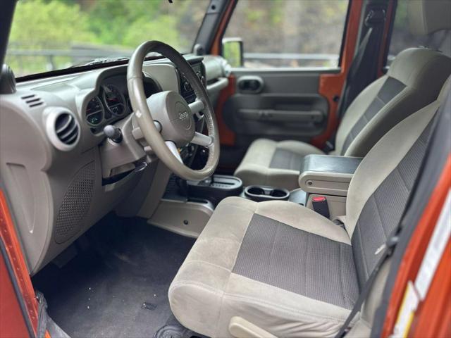 used 2010 Jeep Wrangler Unlimited car, priced at $13,999