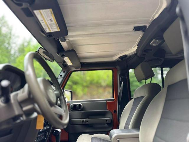 used 2010 Jeep Wrangler Unlimited car, priced at $13,999