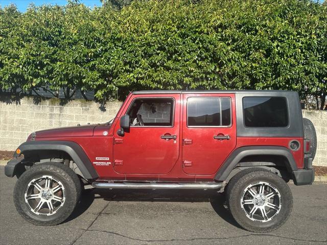 used 2010 Jeep Wrangler Unlimited car, priced at $13,995