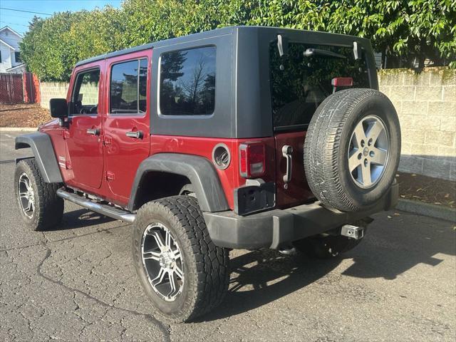 used 2010 Jeep Wrangler Unlimited car, priced at $13,995