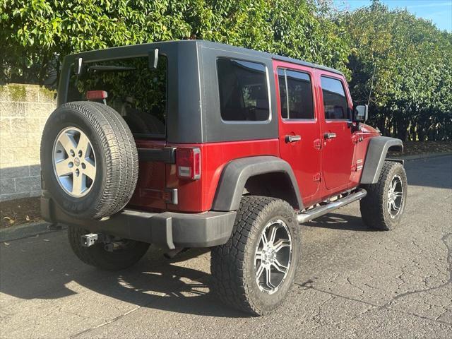 used 2010 Jeep Wrangler Unlimited car, priced at $13,995