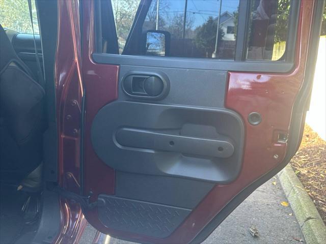 used 2010 Jeep Wrangler Unlimited car, priced at $13,995