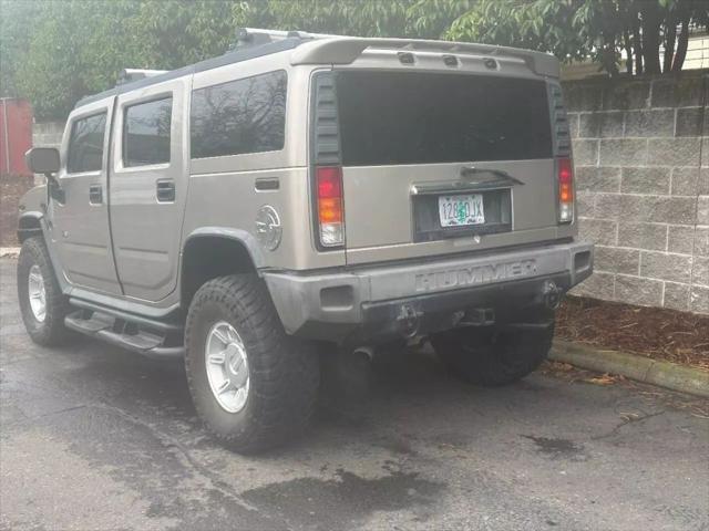 used 2003 Hummer H2 car, priced at $9,999