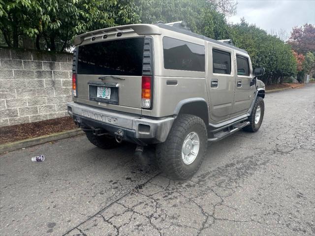 used 2003 Hummer H2 car, priced at $9,999