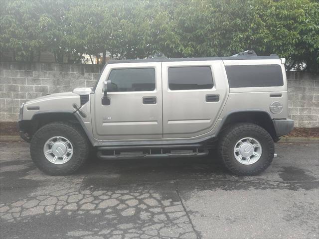 used 2003 Hummer H2 car, priced at $9,999