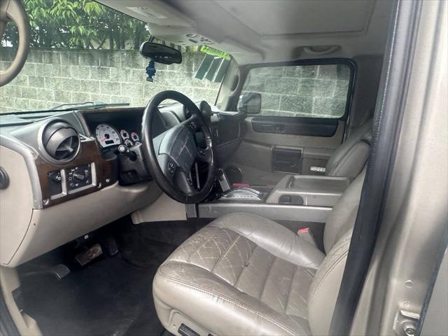 used 2003 Hummer H2 car, priced at $9,999