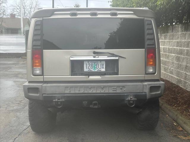 used 2003 Hummer H2 car, priced at $9,999