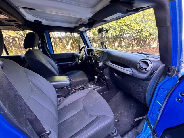 used 2015 Jeep Wrangler Unlimited car, priced at $15,995