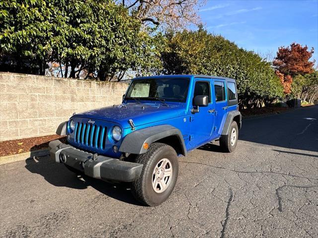 used 2015 Jeep Wrangler Unlimited car, priced at $15,995