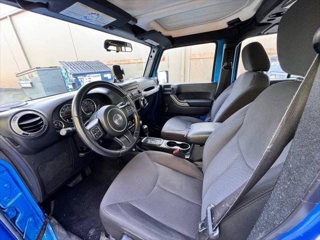 used 2015 Jeep Wrangler Unlimited car, priced at $15,995