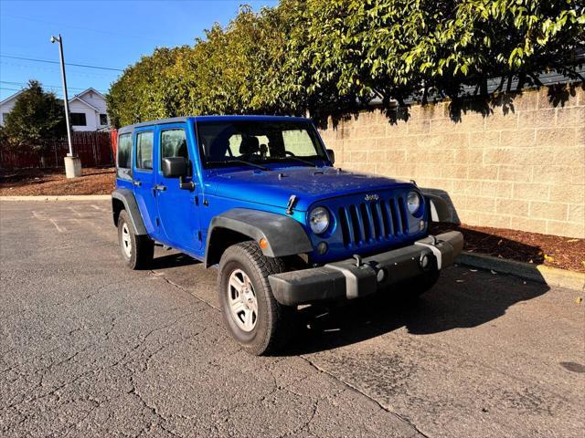 used 2015 Jeep Wrangler Unlimited car, priced at $15,995