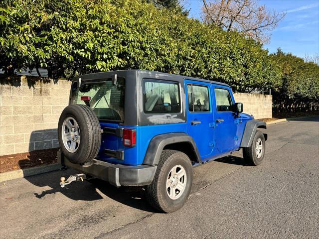 used 2015 Jeep Wrangler Unlimited car, priced at $15,995