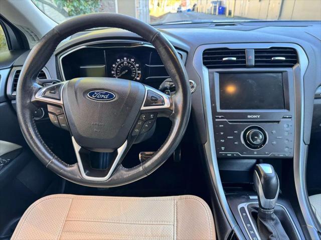 used 2015 Ford Fusion car, priced at $7,499