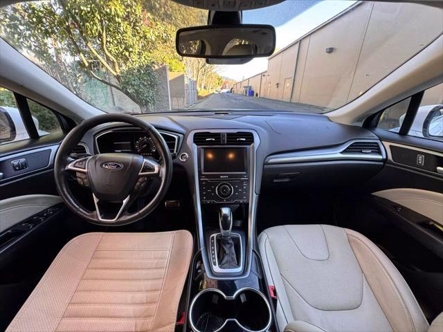 used 2015 Ford Fusion car, priced at $7,499