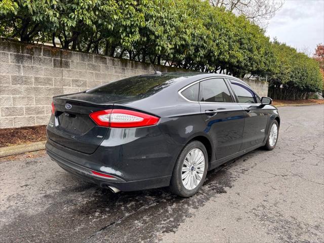 used 2014 Ford Fusion Energi car, priced at $10,999