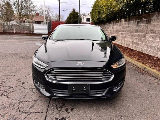 used 2014 Ford Fusion Energi car, priced at $10,999