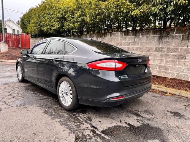 used 2014 Ford Fusion Energi car, priced at $10,999