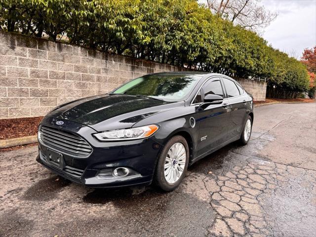 used 2014 Ford Fusion Energi car, priced at $10,999