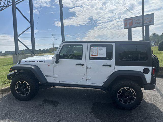 used 2015 Jeep Wrangler Unlimited car, priced at $19,593