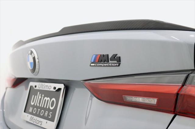 used 2022 BMW M4 car, priced at $67,800