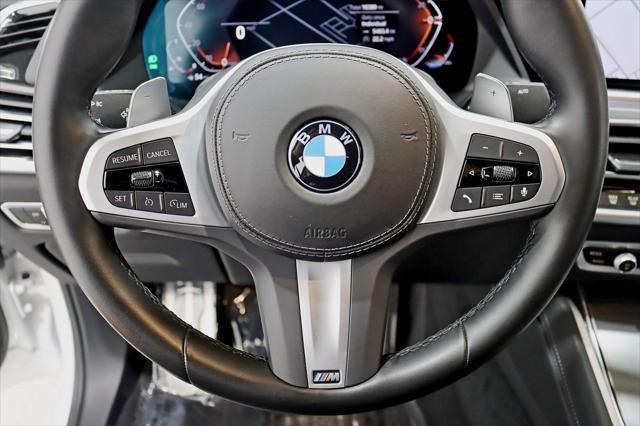 used 2022 BMW X6 car, priced at $60,980