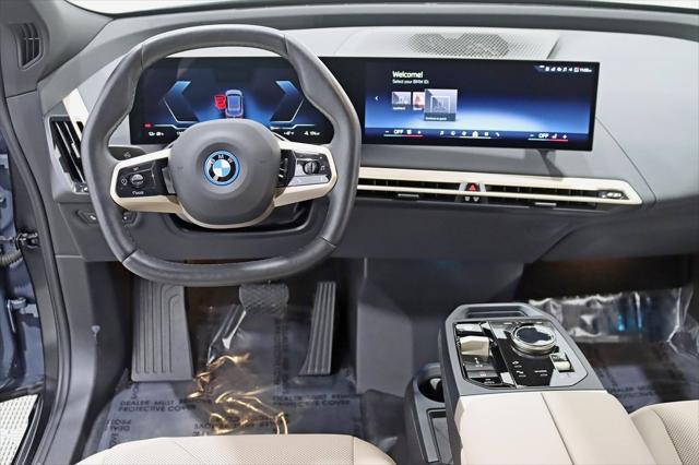 used 2024 BMW iX car, priced at $65,980