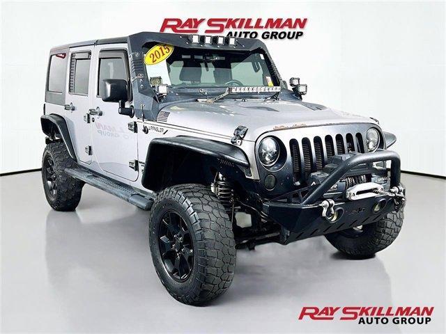 used 2015 Jeep Wrangler Unlimited car, priced at $22,975