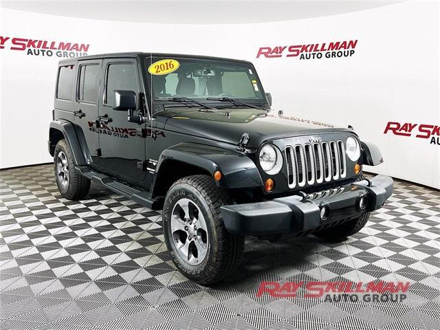 used 2016 Jeep Wrangler Unlimited car, priced at $29,975
