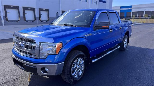 used 2014 Ford F-150 car, priced at $15,799