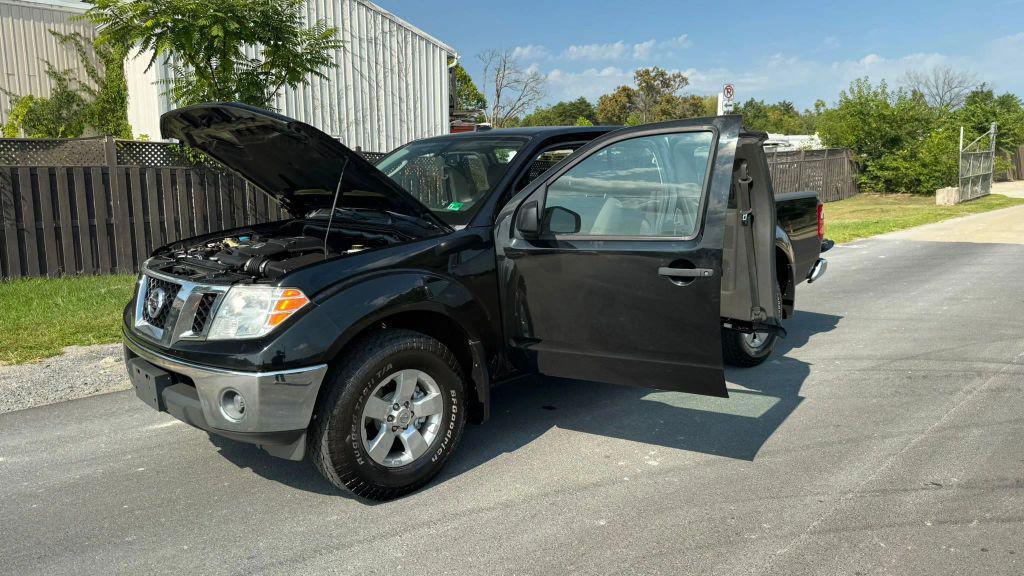used 2011 Nissan Frontier car, priced at $9,999