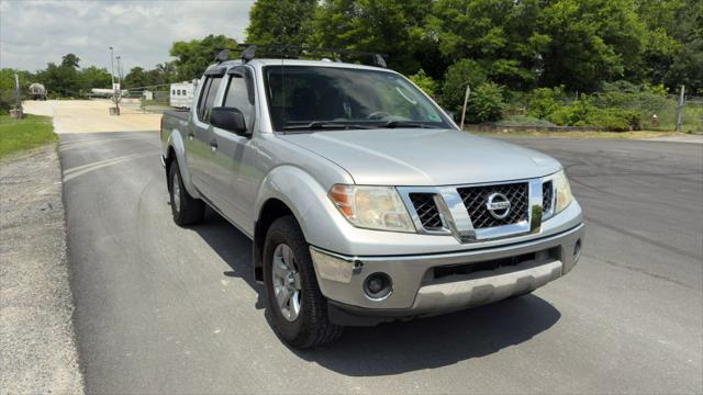 used 2011 Nissan Frontier car, priced at $9,999