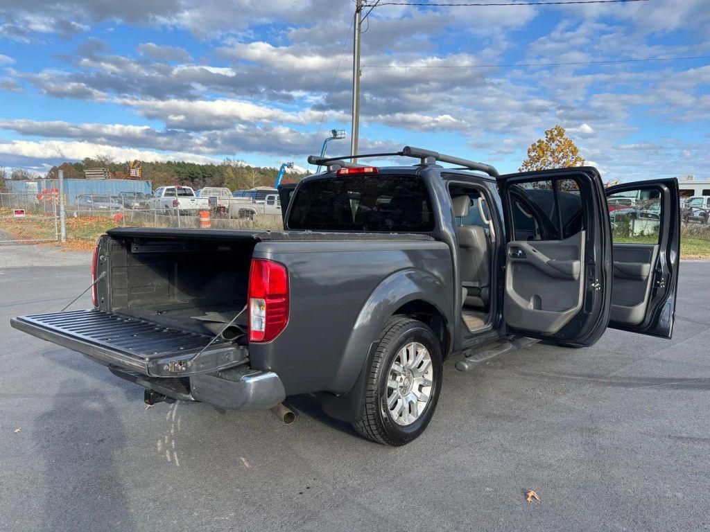used 2010 Nissan Frontier car, priced at $9,999
