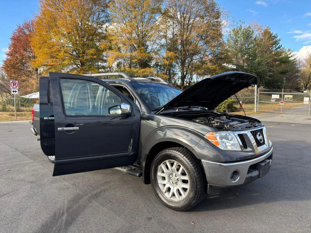 used 2010 Nissan Frontier car, priced at $9,999