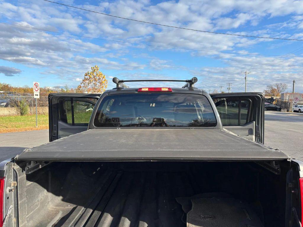 used 2010 Nissan Frontier car, priced at $9,999