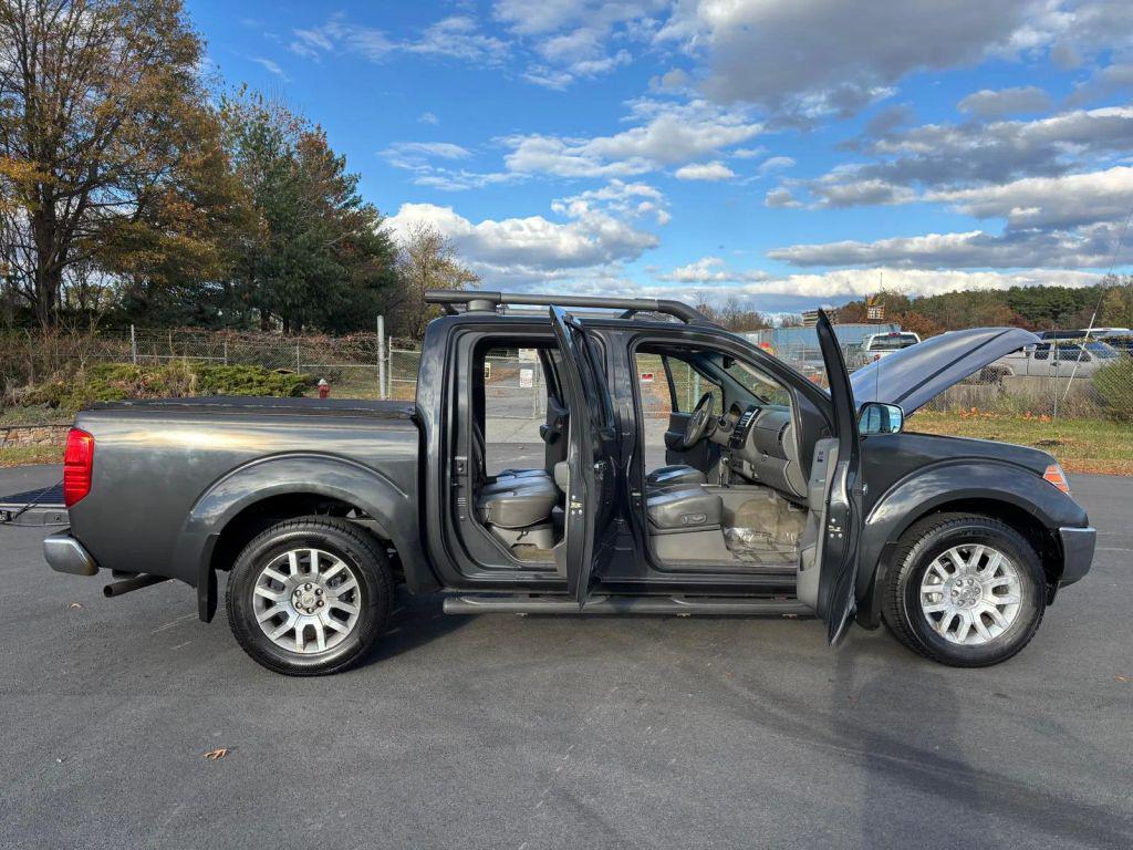 used 2010 Nissan Frontier car, priced at $9,999