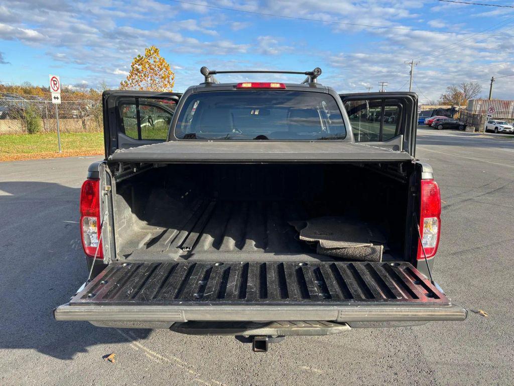 used 2010 Nissan Frontier car, priced at $9,999