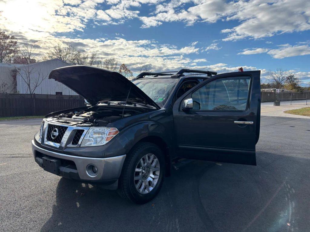 used 2010 Nissan Frontier car, priced at $9,999