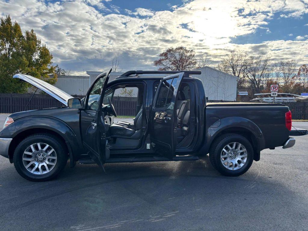 used 2010 Nissan Frontier car, priced at $9,999